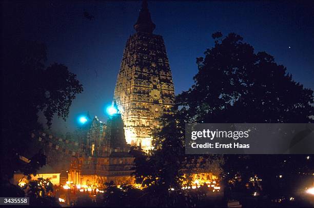 The Mahabodhi Temple of Great Enlightenment, holiest site of Buddhism, in Bodhgaya, India. Himalayan pilgrimage book