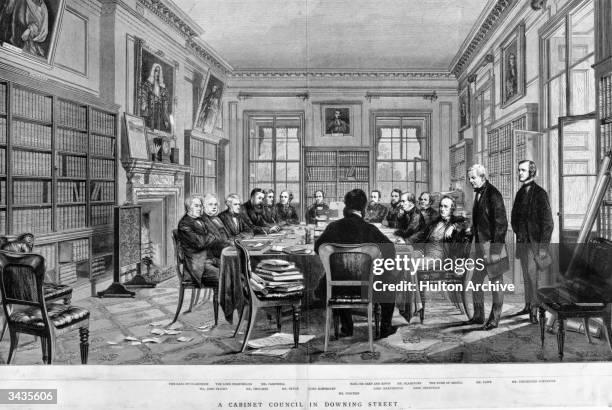 Liberal prime minister William Ewart Gladstone presides over a cabinet meeting at Number 10, Downing Street, London. Also present are the Earl of...