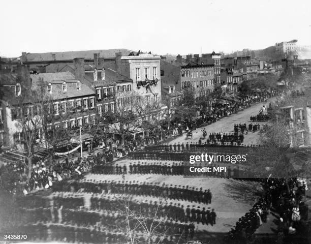 Part of the procession accompanying the body of assassinated President, Abraham Lincoln, from the White House to the Capitol Building in Washington...