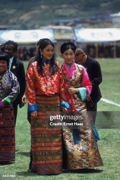 On the right the Queen Mother of Bhutan, Her Royal Highness Ashi Kesang and a member of the royal family at the coronation of King Jigme Singye...