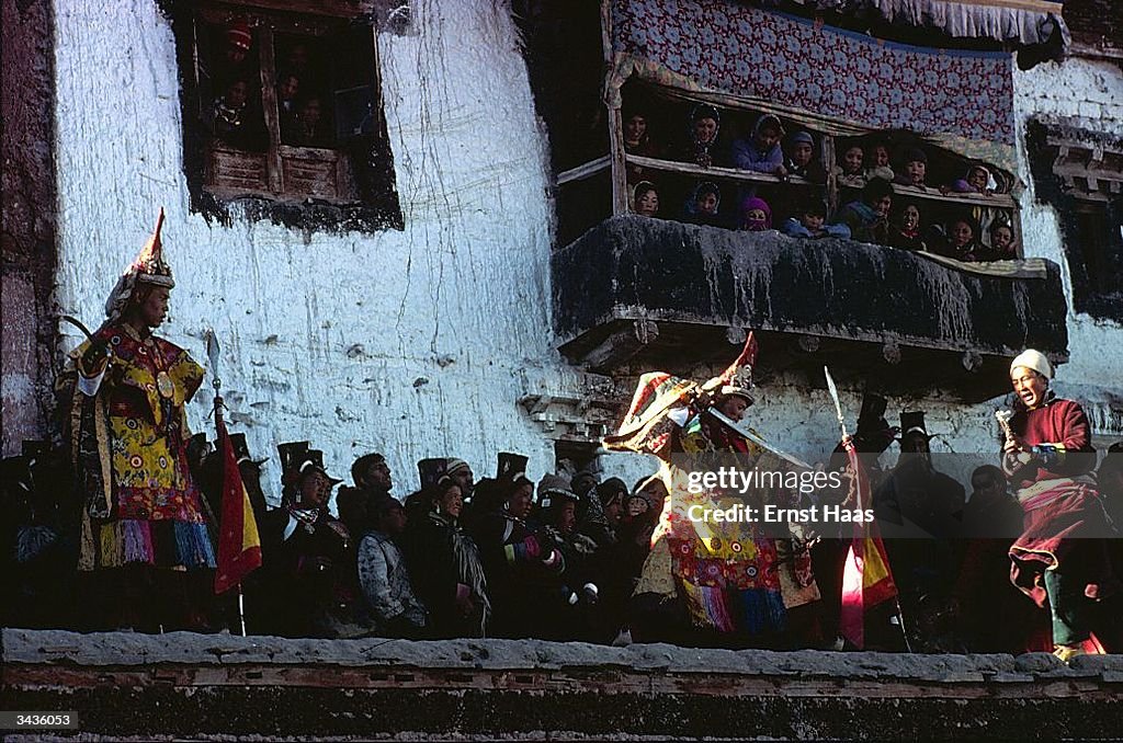 Matho Oracle Photo A group of Ladakhis watch two oracles at Matho Gompa monastery, one ...