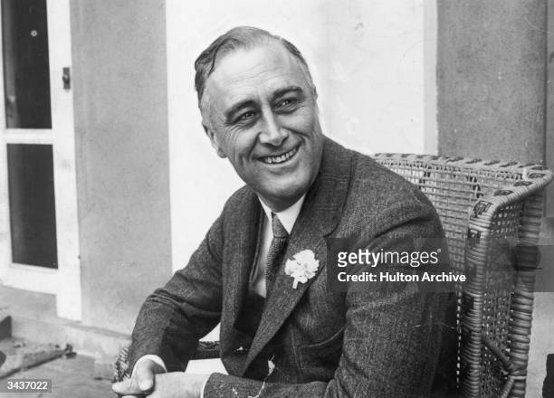American statesman Franklin Delano Roosevelt smiling when he heard that he was leading the contest for Governor of New York State. He later became...