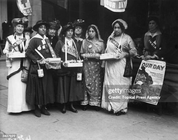 Women collecting funds for 'Our Day', which aims to help soldiers at the front during World War I, 19th October 1916. From second left, the women...