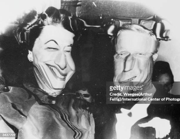 Duke of Windsor and his wife the Duchess of Windsor in a distorting mirror.
