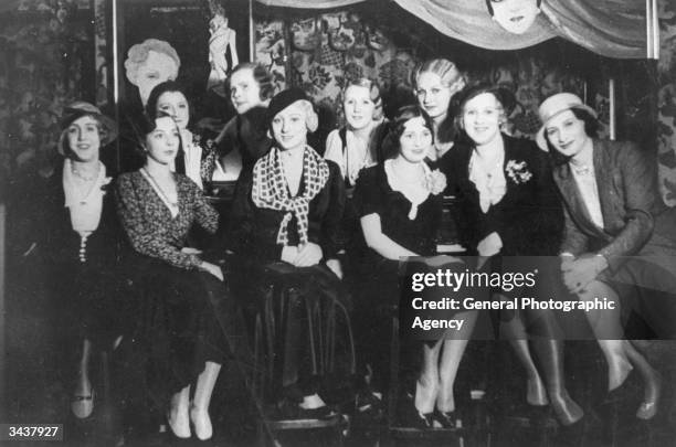 Group of women and four transvestites at the bar of the Eldorado nightclub in Berlin's Schoneberg district. The Eldorado was a popular night spot for...