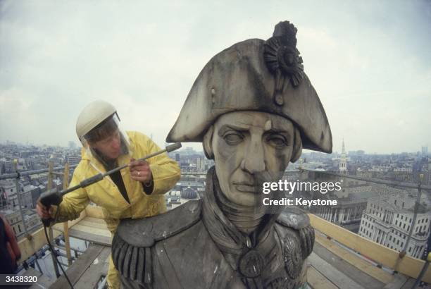 Nelson's Column in Trafalgar Square gets a spring clean.