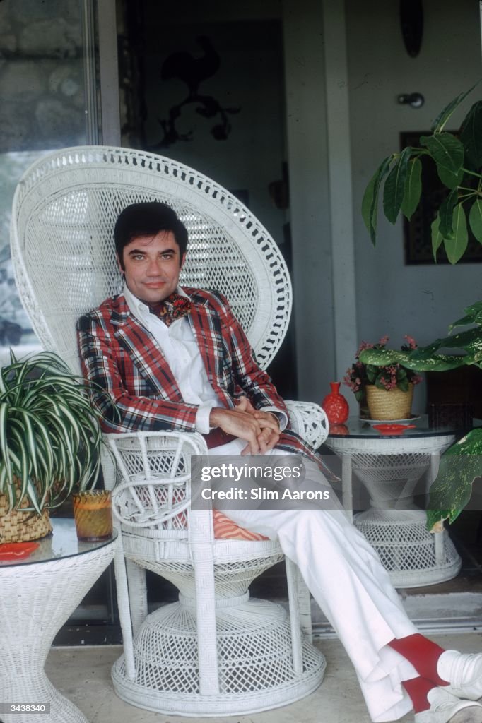 Rex Reed House Actor and film critic Rex Reed relaxes in a wicker chair on Great ...