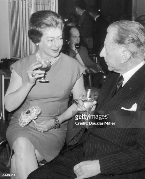 American millionaire J Paul Getty and Mary Teissier attend a party at the Cafe Royal on London's Regent Street, to celebrate the cafe's 100th...
