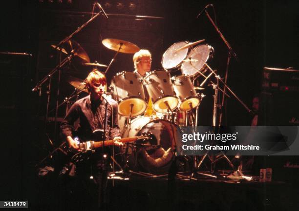 Singer and guitarist Paul Weller and drummer Rick Buckler of Punk/Mod group The Jam in performance.