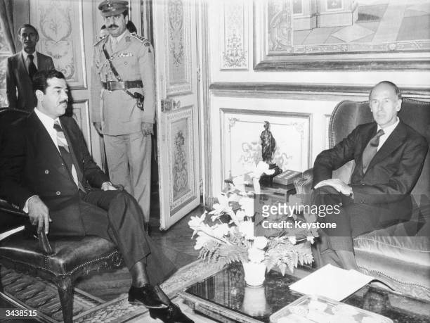 Iraqi vice-president Saddam Hussein meets French President Valery Giscard D'Estaing at the Elysee Palace, during an official visit to Paris.