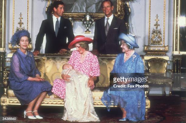 Diana, Princess of Wales holding her son Prince William with Charles, Prince of Wales , Prince Philip the Duke of Edinburgh, Queen Elizabeth II and...