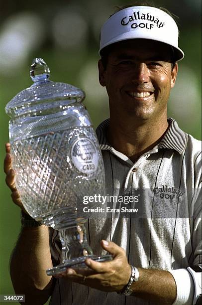 Olin Browne holds the trophy after winning the Greater Hartford Open at TPC at River Highlands in Cromwell, Connecticut. Mandatory Credit: Ezra O....