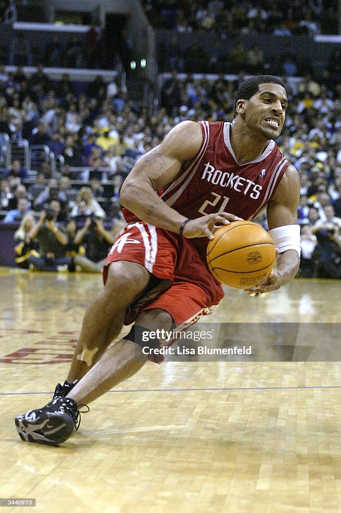 Jim Peterson Rockets Jim Jackson of the Houston Rockets slips with the ball during Game ...