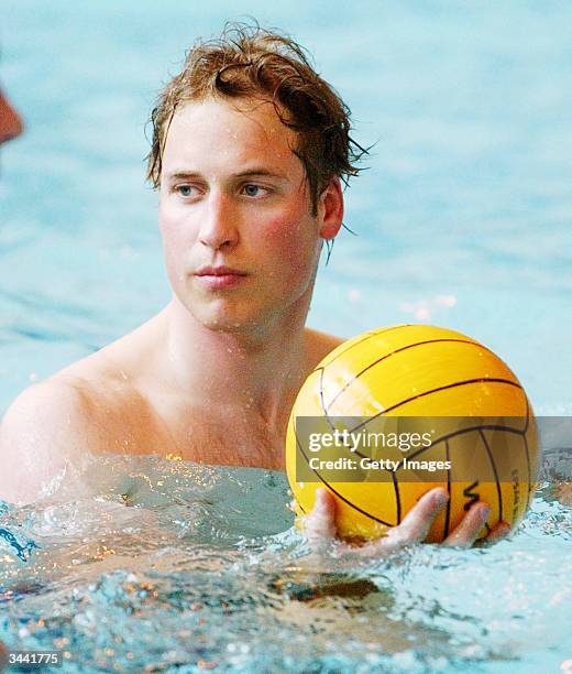 Prince William warms up before his water polo debut for the Scottish National Universities Squad in the Annual Celtic Nations Tournament against...