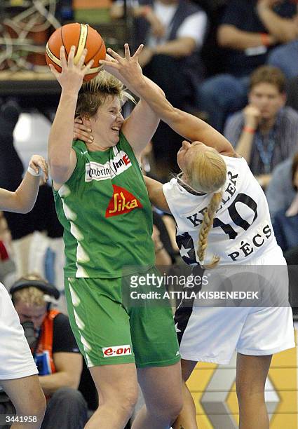 Czech Alena Kovacova of Gambrinus JME Brno figths for the ball with Hungarian Pecs' Annamaria Keller 18 April 2004 during their match for the third...