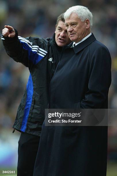 Newcastle manager Sir Bobby Robson chats with assistant John Carver during the FA Barclaycard Premiership match between Aston Villa and Newcastle...