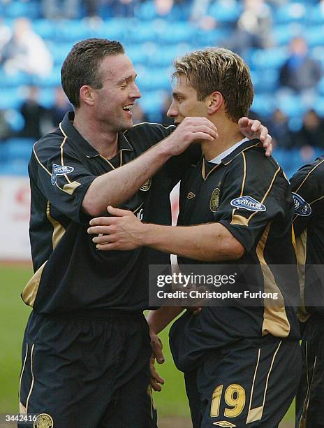 Celtic captain Paul Lambert congratulates Stilian Petrov on his goal during the Scottish Premier League match between Kilmarnock and Celtic at Rugby...