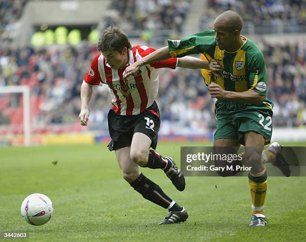 John Oster of Sunderland clashes with James Chambers of WBA during the FA Barclaycard Premiership match between Sunderland and West Bromwich Albion...