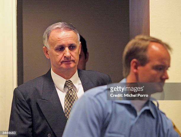 Bosnian general Radislav Krstic arrives at the War Crimes Tribunal April 19, 2004 in The Hague, The Netherlands. Krstic, convicted of genocide and...