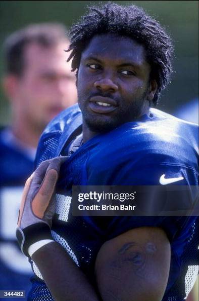 Linebacker Hillary Butler of the Denver Broncos looks on during the ...