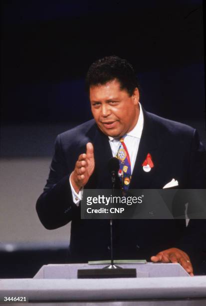 Atlanta mayor Maynard Jackson delivers a speech from a podium on stage at the Democratic National Convention, New York City, July 1992.