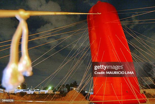 The biggest condom ever made can be seen 19 April, 2004 in Sao Paulo, Brazil. The red condom, made of nylon by Brazilian artist Degmar Covos as an...