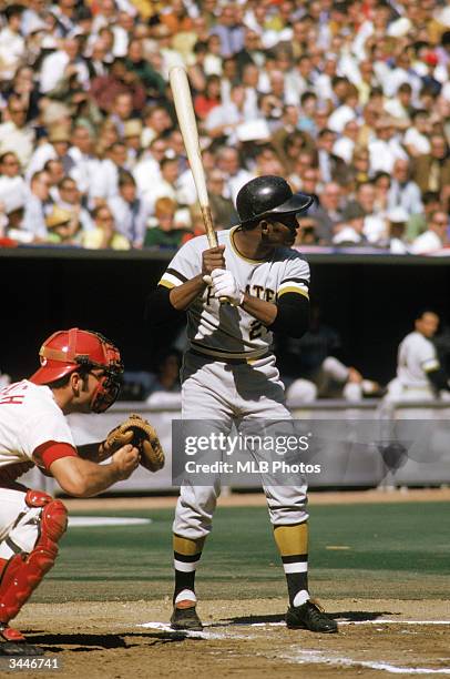 Roberto Clemente of the Pittsburgh Pirates readies for the pitch during his first National League Championship Series against the Cincinnati Reds....