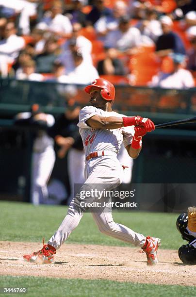 Eric Davis of the Cincinnati Reds swings at a pitch during a game against the Giants at Candlestick Park on August 6, 1996 in San Francisco,...