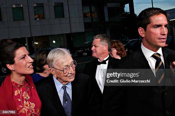 Basketball coach John Wooden , James Caviezel and his wife Kerri attend "Bobby Jones - Stroke of Genius" World Premiere at the Academy of Motion...