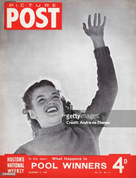 American actress Marilyn Monroe raises her hand on the cover of Picture Post magazine, December 1947. The headline beneath reads 'What Happens to...