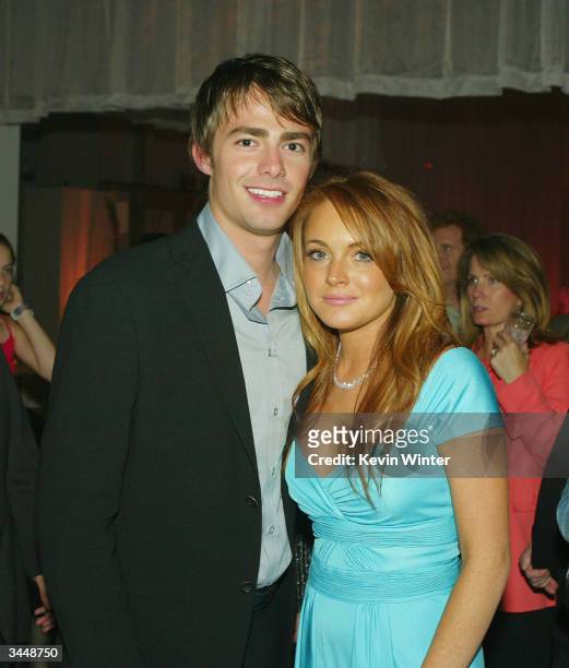 Cast members Jonathan Bennett and Lindsay Lohan pose at the after-party for Paramount's "Mean Girls" at the Cinerama Dome Theater on April 19, 2004...