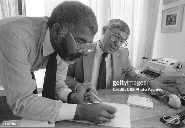 American broadcast journliast Ed Bradley and producer Don Hewitt work on a story for the news program '60 Minutes,' January 3, 1985.