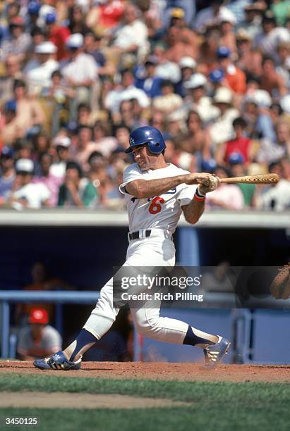 Steve Garvey of the Los Angeles Dodgers swings at a pitch during a game circa 1969-1982 at Dodger Stadium in Los Angeles, California.