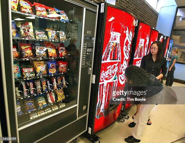 Students purchase soft drinks from vending machines at Jones College Prep High School April 20, 2004 in Chicago, Illinois. The Chicago Public School...