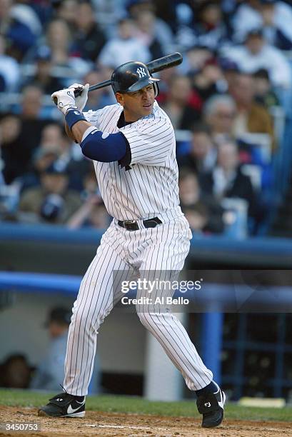 Alex Rodriguez of the New York Yankees bats during their opening home game against the Chicago White Sox on April 9, 2004 at Yankee Stadium in the...