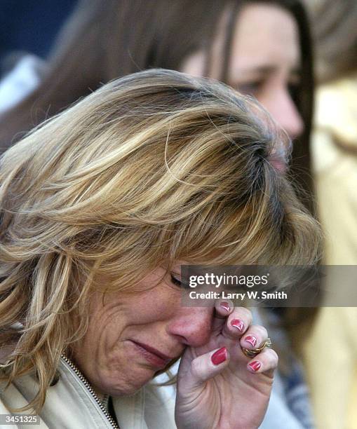 Tammy Rafferty Tammy Rafferty wipes away tears April 20, 2004 during a candle light ...