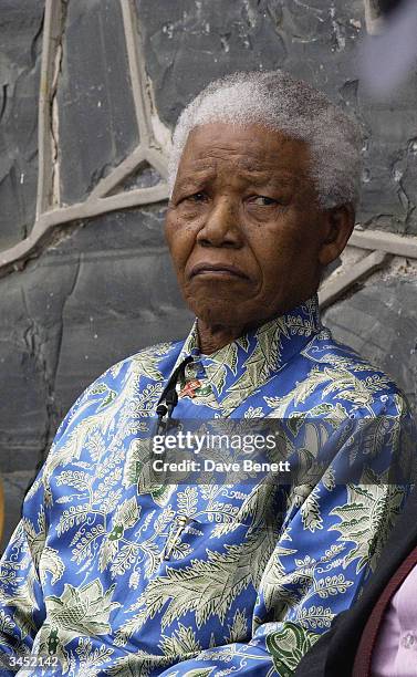 Nelson Mandela attends the Robben Island Prison Press Conference where Nelson Mandela was imprisoned at Robben Island on November 28, 2003 in Cape...