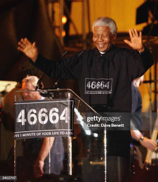 Nelson Mandela performs at The Nelson Mandela Foundation's "46664 Give One minute to Aids" Concert at The Greenpoint Stadium on November 29, 2003 in...