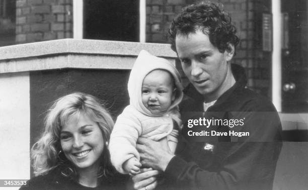 American actress Tatum O'Neal with her husband American Tennis star John McEnroe and their baby son, Kevin, 1985.