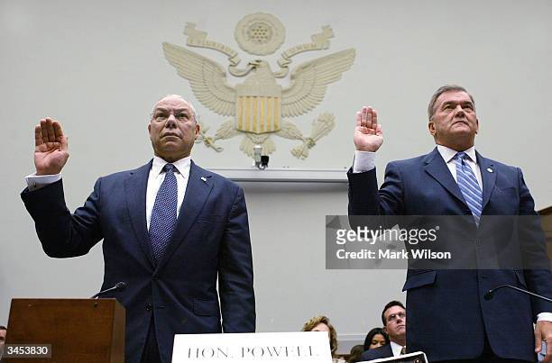 Secretary of State Colin Powell and Homeland Security Director Tom Ridge are sworn in before testifing to a the House Judiciary Committee on Capitol...