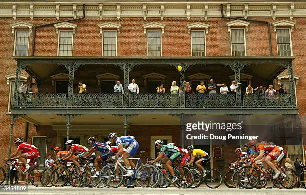 The Peloton passes the Springer Opera House as they enter the final curcuit in Columbus during Stage 2 of the Tour de Georgia on April 21, 2004 from...