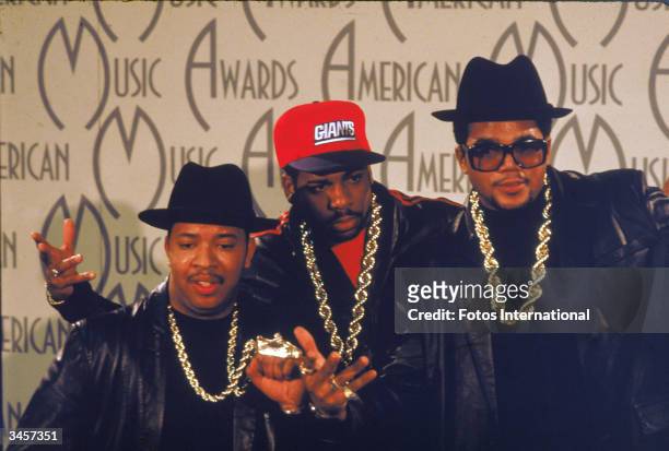 Portrait of American hip-hop and rap group Run-DMC at the American Music Awards, 1980s. Left to right, Darryl McDaniels , Joe Simmons , and Jason...