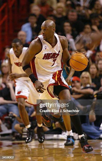 Lamar Odom of the Miami Heat moves the ball up court during the game against the New Orleans Hornets in Game One of the Eastern Conference...