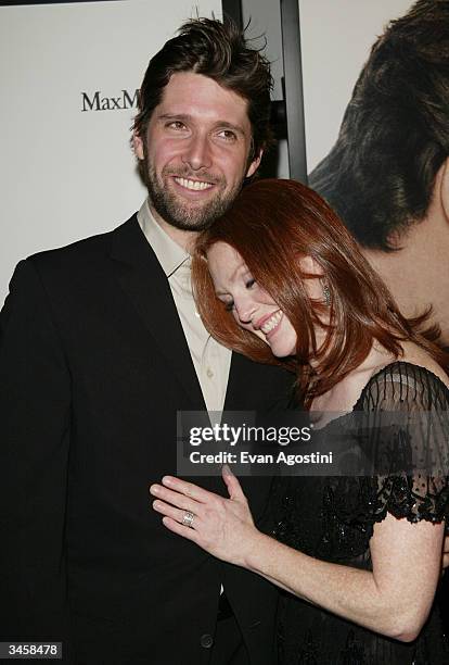 Actress Julianne Moore and husband Bart Freundlich attend New Line Cinema's "Laws Of Attraction" film premiere on April 22, 2004 at the Loews Astor...