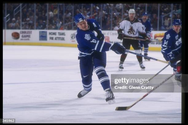 Center Mats Sundin of the Toronto Maple Leafs shoots the puck during a game against the Phoenix Coyotes at the America West Arena in Phoenix,...