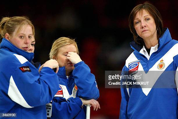 Scotland's women curling team Sheila Swan, Katriona Fairweather, Anne Laird and skipper Jackie Lockhart look disappointed after losing their decisive...