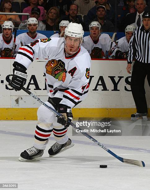 Defender Bryan Berard of the Chicago Blackhawks advances the puck during the game against the Washington Capitals at the MCI Center on March 12, 2004...