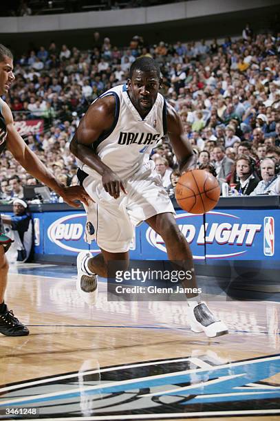 Michael Finley of the Dallas Mavericks drives to the hoop against the Memphis Grizzlies during the game at American Airlines Arena on April 13, 2004...