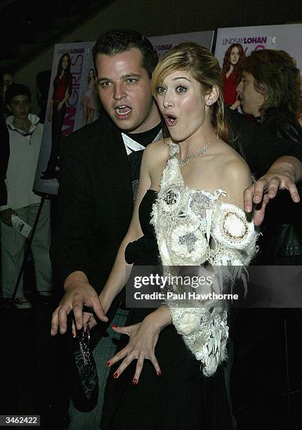 Actor Daniel Franzese and actress Lizzy Caplan attend a private screening of "Mean Girls" on April 23, 2004 at Loews Lincoln Square Theater, in New...