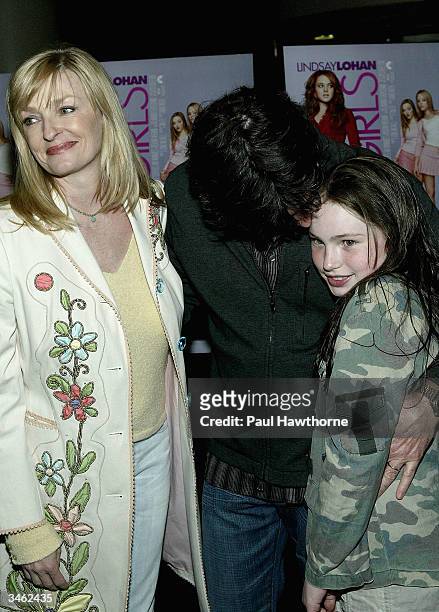 Actor Peter Gallagher with his wife Paula and daughter Catherine attend a private screening of "Mean Girls" on April 23, 2004 at Loews Lincoln Square...